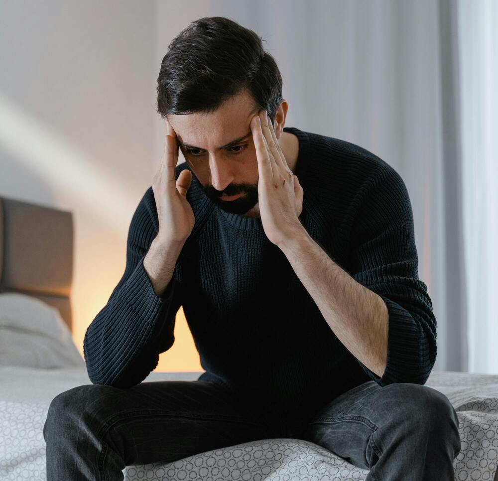 Individual reflecting on emotional struggles