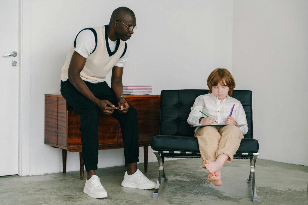 Therapist and child having a counselling session