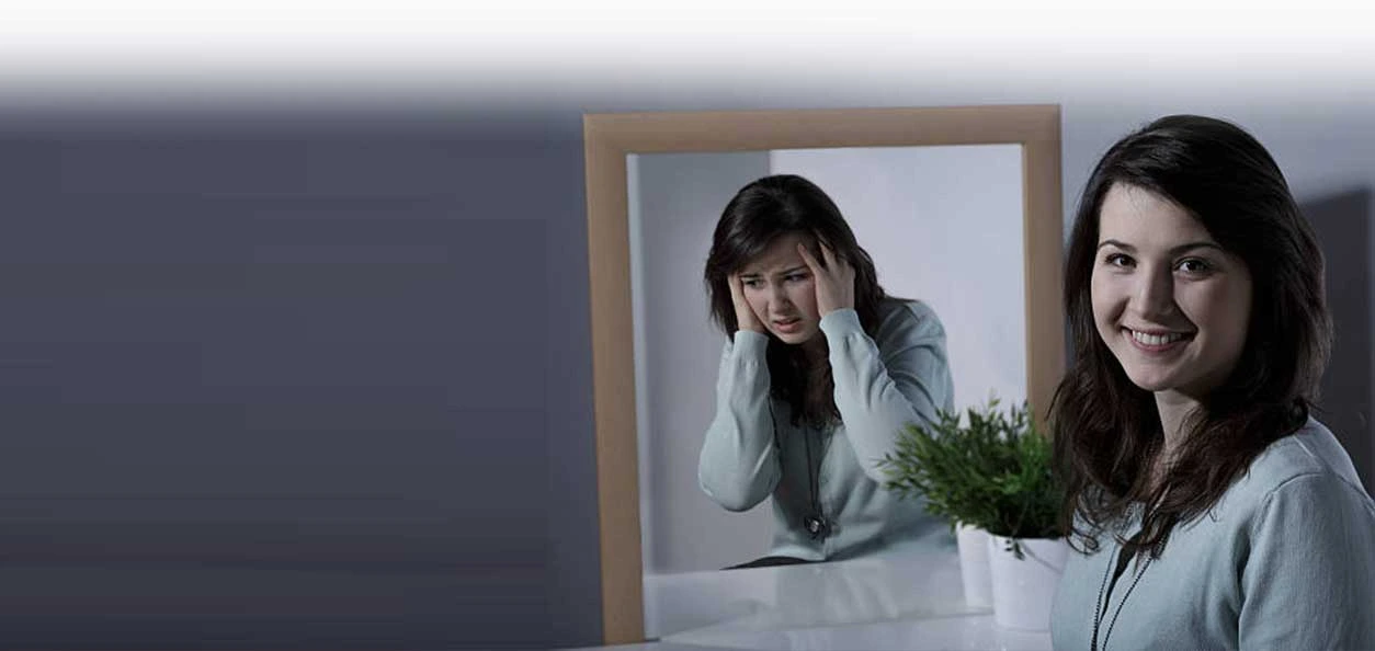 Understanding Personality Disorders and Therapy Options 1 Woman saying she is happy but really being unhappy inside - needing to see a counsellor