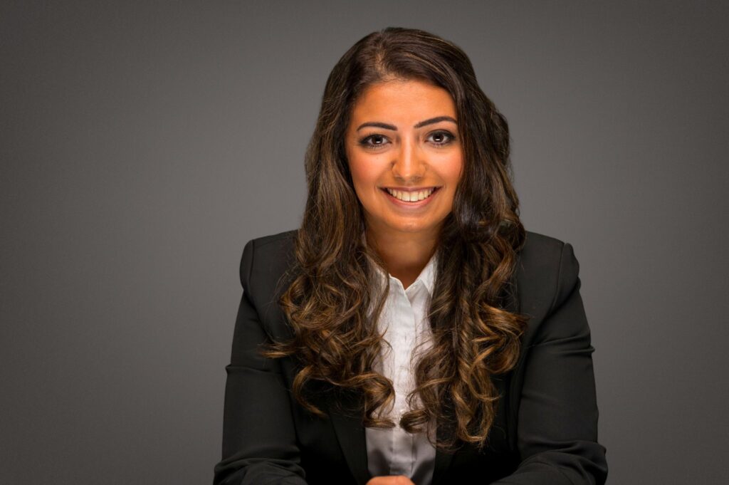 Professional headshot of Rita El Maraghi, a Winnipeg therapist at Oakville Wellness Center specializing in adult mental health support.