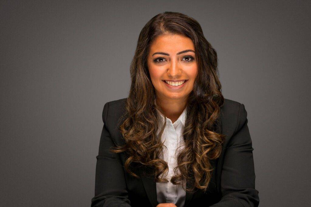 Professional headshot of Rita El Maraghi, a Winnipeg therapist at Oakville Wellness Center specializing in adult mental health support.