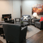 Cozy therapy office at Oakville Wellness Center’s 2B – 553 St. Mary’s Road location in Winnipeg, offering speech therapy and mental health services.